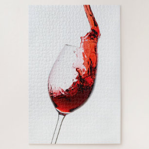 Rotwein fließt ins Weinglas Puzzle