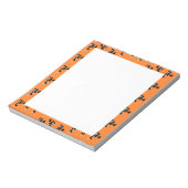 Rotzunge auf Orange Notizblock (Rotiert)