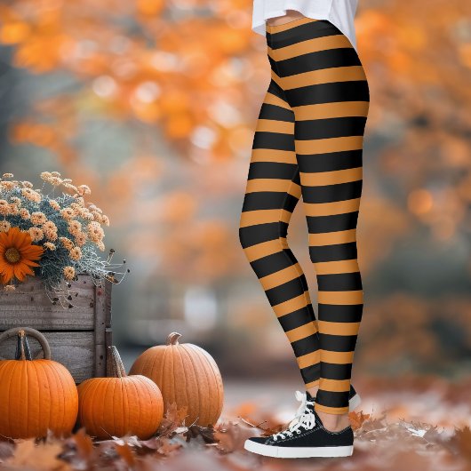 Rotzunge schwarz und orange gestreift leggings