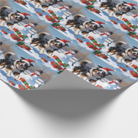 Rough Collie läuft im Schnee mit Weihnachtshut Geschenkpapier (Ecke)