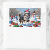 Rough Collie läuft im Schnee mit Weihnachtshut Rechteckiger Aufkleber (Tasche)