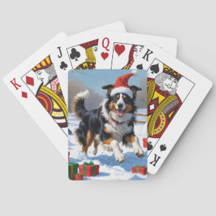 Rough Collie läuft im Schnee mit Weihnachtshut Spielkarten
