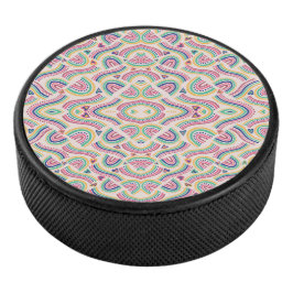 Round coaster with vibrant, symmetrical mandala eishockey puck