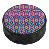 Round object with a vibrant geometric pattern eishockey puck (3/4)