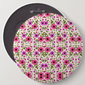 Round wall clock with a vibrant floral design button (Vorne & Hinten)