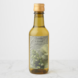 Rranunkulus und Lillacke auf texturiertem Papier Weinetikett