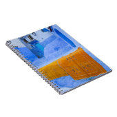 Rugs auf einer blauen Mauer Notizblock (Rechte Seite)