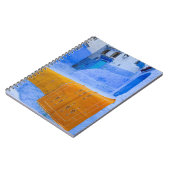 Rugs auf einer blauen Mauer Notizblock (Linke Seite)