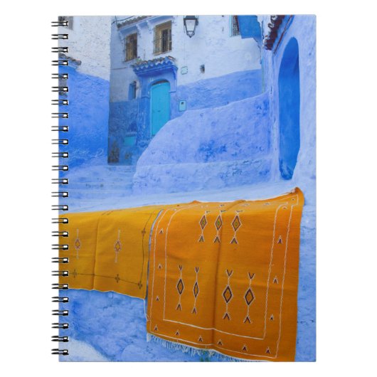 Rugs auf einer blauen Mauer Notizblock (Vorderseite)