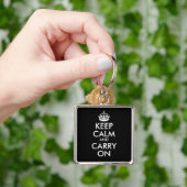 Ruhe bewahren und Schlüsselanhänger tragen (Hand)