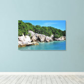 Ruhige tropische Küste mit Höhlen Leinwanddruck (Insitu (Holzboden))