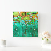 ruhiger grüner Teich mit Lilypaden Quadratische Wanduhr (Zuhause)