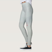 Ruhiges Wintermeer und roter Leuchtturm Leggings (Links)