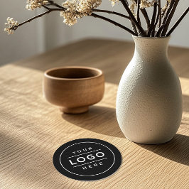 Rund um das Logo für "Schwarze Unternehmen" Runder Pappuntersetzer