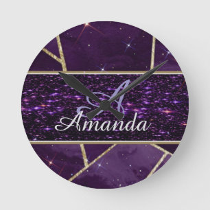 runde lila glitzernde goldene Uhr