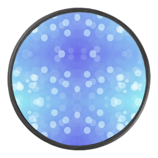 Runder blauer Bluetooth-Lautsprecher mit einem Fro Eishockey Puck (Vorderseite)