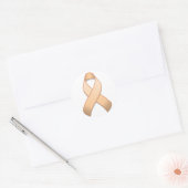 Runder Sticker für die Peach Awareness Ribbon (Umschlag)