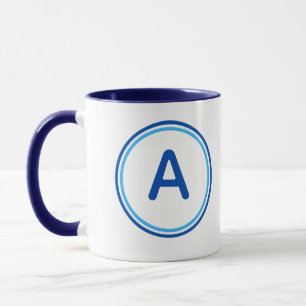 Rundes Buchstabenalphabet Blaues Kreisdesign Tasse