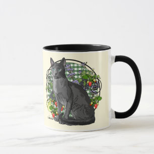 Russische blaue Katze mit Beeren Tasse