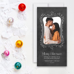 Rustic Black Chalkboard Merry Christmas Photo Feiertagskarte<br><div class="desc">Send your Christmas wishes with a whimsical and chic holiday photo card. A festive hand-drawn white chalk doodle border with stars and snowflakes frames your vertical photo.  Includes a black board style background.</div>