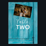 Rustic Blue Wood 2 Fotos Wedding Guest Names Tischnummer<br><div class="desc">Dieses Design ist mit einem blauen rustikalen Holzhintergrund mit einer Auswahl an Fotos für Ihr persönliches Paar ausgestattet. Der rustikal blaue Holzboden wird durch den weißen Text und ein persönliches Foto auf der einen Seite und ein anderes persönliches Foto auf der anderen Seite ergänzt. Die blauen Holztöne schaffen ein rustikales...</div>