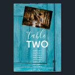 Rustic Blue Wood 2 Fotos Wedding Guest Names Tischnummer<br><div class="desc">Dieses Design ist mit einem blauen rustikalen Holzhintergrund mit einer Auswahl an Fotos für Ihr persönliches Paar ausgestattet. Der rustikal blaue Holzboden wird durch den weißen Text und ein persönliches Foto auf der einen Seite und ein anderes persönliches Foto auf der anderen Seite ergänzt. Die blauen Holztöne schaffen ein rustikales...</div>