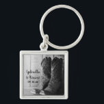 Rustic Cowboy Boots Country Western Wedding Schlüsselanhänger<br><div class="desc">Create a charming party favor or keepsake gift when you personalize the charming Rustic Cowboy Boots Country Western Wedding Keychain with the personal names of the bride and groom and their marriage ceremony date. This country chic custom ranch theme wedding key chain features a digitally enhanced black and white photograph...</div>