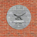 Rustic Gray Wood Couple Name Wedding Anniversary  Große Wanduhr<br><div class="desc">Wedding clocks to personalize with new couple last name. The rustic gray wood background adds a country chic look. A great gift for weddings and new home housewarming.</div>