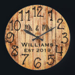 Rustic Personalized Brown Wood Custom Große Wanduhr<br><div class="desc">Beautiful, einzigartig, one-of-a-kind personalized design feature a-rustic brown wood with black personalization his and her names in a script machen overlay design and the last name and year establishd in a bold script with a printed wood background. Personalize this clock by adding your personal information. Makes a great wedding, anniversary,...</div>