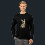 Rustic Rabbit Tri-Blend Shirt<br><div class="desc">Embrace the charm of the countryside with this beautifully detailed sketch of a bunny enjoying a carrot. With a vintage,  hand-drawn aesthetic and soft sepia tones,  this design brings a touch of rustic warmth to your wardrobe. Perfect for gardeners,  nature lovers,  or anyone who appreciates classic animal illustrations.</div>
