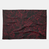 Rustikal roter Schwamm auf schwarzem oder dunkelro Geschirrtuch (Horizontal)