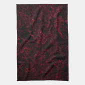 Rustikal roter Schwamm auf schwarzem oder dunkelro Geschirrtuch (Vertikal)