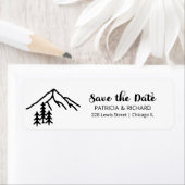 Rustikale Berge überfluten das Datumsschild (Insitu)