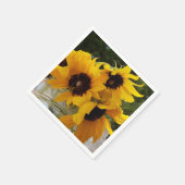 Rustikale, frisch gelbe Sonnenblumen in einem Maso Serviette (Ecke)