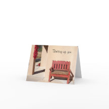 Rustikale rote Bank über Denken Sie an Sie notecar