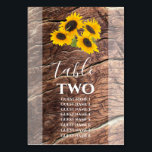Rustikale Sonnenblume Hochzeitsgäste Tischnummer<br><div class="desc">Dieses Design zeichnet sich durch rustikale Sonnenblumen auf einem Holzboden aus. Die gelben, grünen und braunen Farbtöne schaffen ein rustikales natürliches Landschaftsbild. Die undurchsichtige Grenze hebt das Sonnenblumenkernstück hervor. Auf der Rückseite wird das gleiche Design angezeigt. Elegantes Hochzeitskartendesign mit modernen Tischnummern. Auch die passenden Hochzeitseinladungen und andere Schreibwaren sind verfügbar....</div>