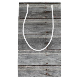 Rustikale verwitterte hölzerne Wand Kleine Geschenktüte