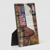 Rustikaler roter verblassener Stall mit Latte in G Fotoplatte (Seite)