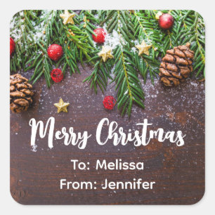 Rustikaler Weihnachtstisch mit Kiefer und Schnee Quadratischer Aufkleber