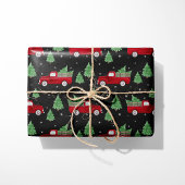 Rustikales rotes LKW-Weihnachtspapier auf schwarze Geschenkpapier