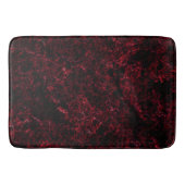 Rustikales schwammiges Rot auf dunkelrotem Hinterg Badematte (Vorderseite)