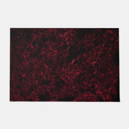 Rustikales schwammiges Rot auf dunkelrotem Hinterg Fußmatte