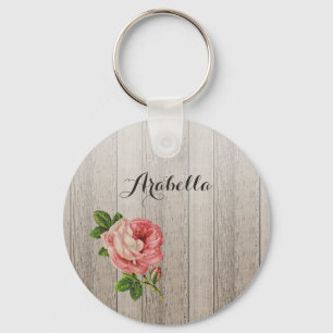 Rustikales, verwittertes Holz mit Vintage-Rose und Schlüsselanhänger