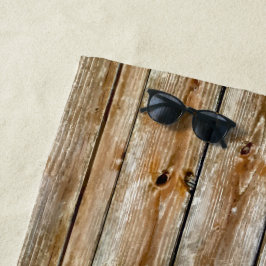 Rustikalisches verwittertes braunes Holzplanken-Na Strandtuch