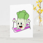 Salat als Skifahrer mit Ski Karte (Gelbe Blume)