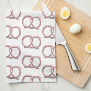 Salzige Pretzel-Drehmuster Rosa Geschirrtuch
