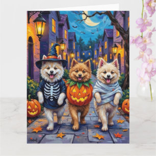 Samojeden-Hunde beim Trick-or-Treat an Halloween-K Karte