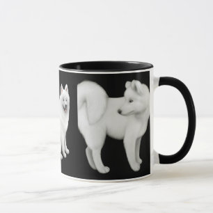 Samoyed verfolgt Wecker-Tasse Tasse