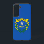 Samsung Galaxy S22 Fallflagge von Nevada Hülle<br><div class="desc">Mit dem Samsung SGH-X500 und dem neuen Samsung SGH-X500 ist das Samsung SGH-E500 der ideale Begleiter für alle, die sich für einen unvergesslichen Aufenthalt interessieren. Dieses Cover wurde mit viel Liebe zum Detail entworfen und zeigt stolz die charakteristischen Elemente der Nevada-Fahne. Es verfügt über ein dunkelblaues Feld mit einem silbernen...</div>