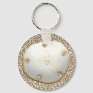 Sand Dollar auf funkelnd goldfarbenem Sandstrand Schlüsselanhänger